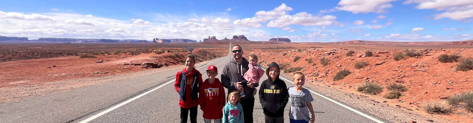 tyler meyer, cfp and his family at forest gump point, arizona